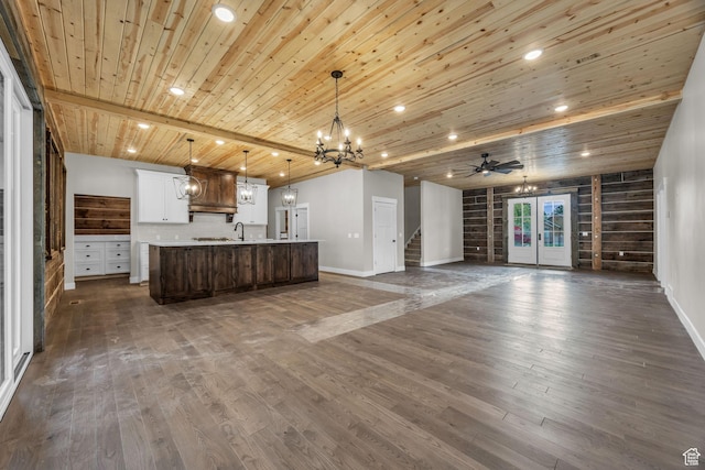 1138 N 1000 E, Mapleton, UT 84664 - kitchen featuring a chandelier, open floor plan, wooden ceiling, baseboards, and a kitchen island with sink