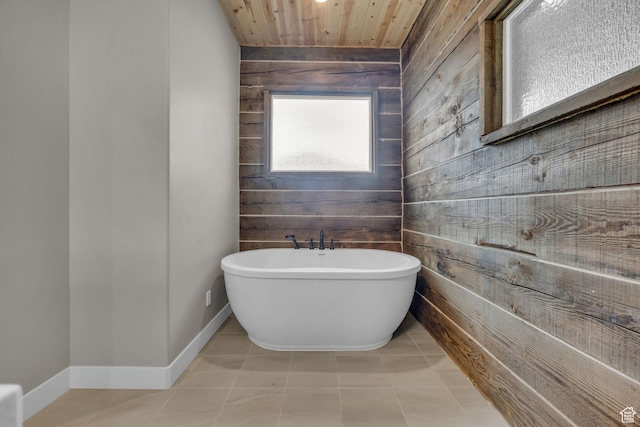 1138 N 1000 E, Mapleton, UT 84664 - bathroom with wooden walls, a soaking tub, wood ceiling, baseboards, and tile patterned flooring