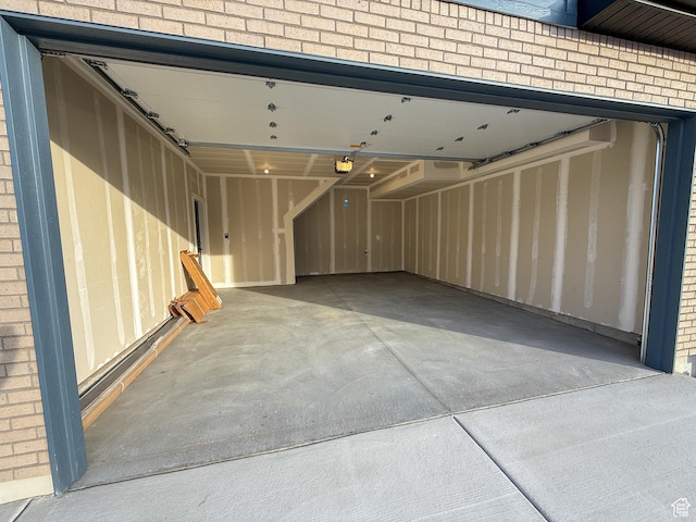 3656 S 4600 W Unit 220, West Haven, UT 84401 - garage featuring a garage door opener and driveway