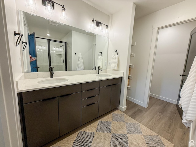 3656 S 4600 W Unit 220, West Haven, UT 84401 - full bath with wood finished floors, double vanity, a sink, and a stall shower