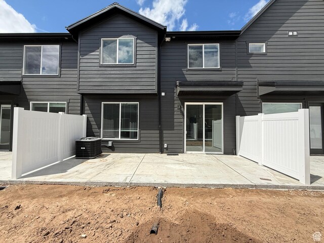 3656 S 4600 W Unit 220, West Haven, UT 84401 - rear view of property with a patio, fence, and cooling unit