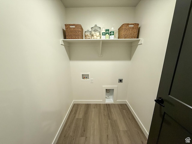 3656 S 4600 W Unit 220, West Haven, UT 84401 - laundry room with laundry area, hookup for a washing machine, baseboards, wood finished floors, and hookup for an electric dryer