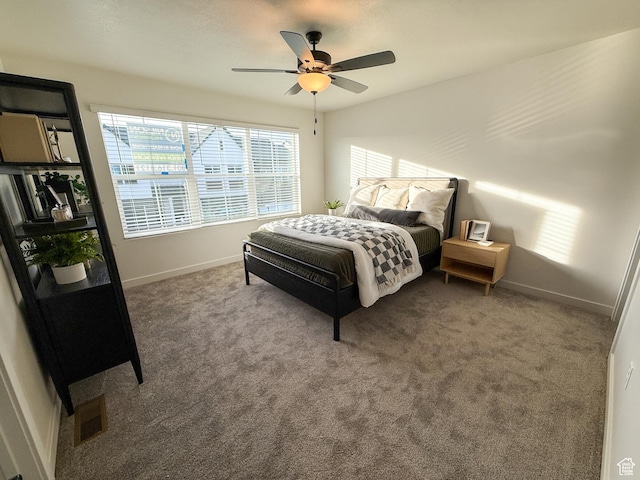 3656 S 4600 W Unit 220, West Haven, UT 84401 - carpeted bedroom with baseboards, multiple windows, a ceiling fan, and visible vents