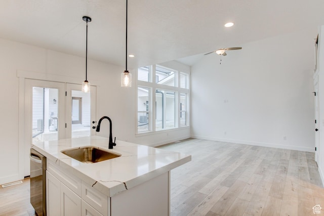 628 W Murray Ln Unit 155, Murray, UT 84123 - kitchen with pendant lighting, a ceiling fan, light wood-style floors, a sink, and dishwasher
