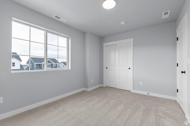 6641 W Spring Snow Ln, Herriman, UT 84096 - unfurnished bedroom featuring carpet flooring and baseboards