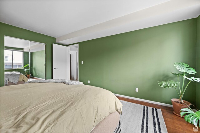 229 N B St Unit 4, Salt Lake City, UT 84103 - bedroom with baseboards and wood finished floors