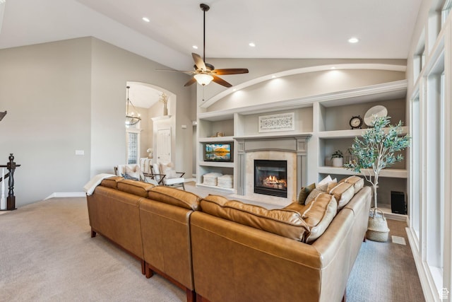 10921 S Renengade View Ln W, South Jordan, UT 84095 - living area featuring ceiling fan, light colored carpet, built in features, a tile fireplace, and recessed lighting