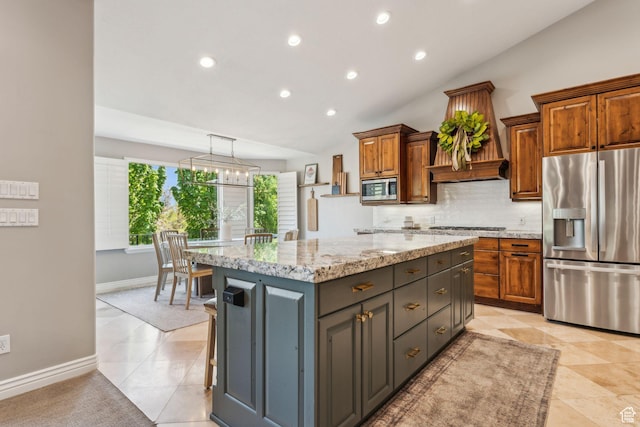 10921 S Renengade View Ln W, South Jordan, UT 84095 - kitchen featuring a kitchen island, backsplash, vaulted ceiling, stainless steel appliances, and recessed lighting