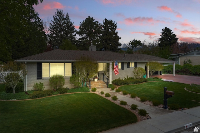 15 S 300 E, Payson, UT 84651 - single story home featuring a lawn, brick siding, and a chimney