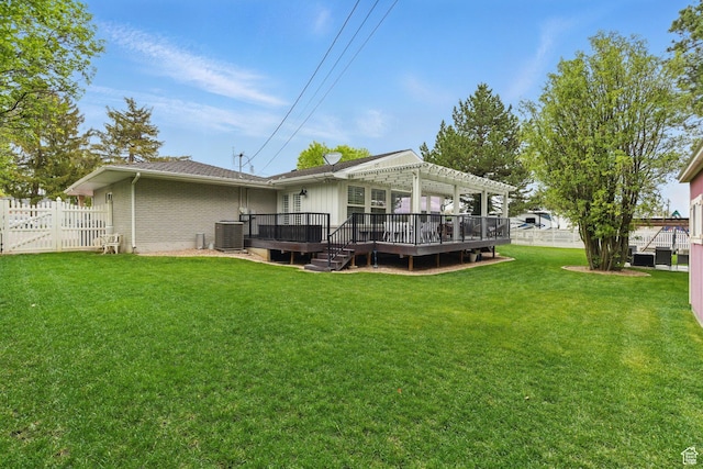 15 S 300 E, Payson, UT 84651 - back of property featuring fence, a pergola, a wooden deck, central air condition unit, and a yard