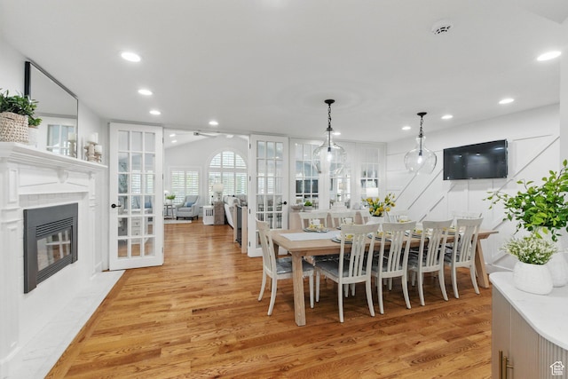 15 S 300 E, Payson, UT 84651 - dining space featuring a fireplace, recessed lighting, and light wood-style floors