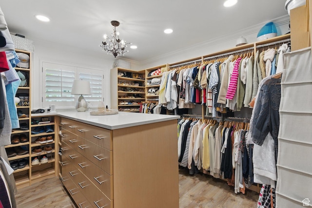 15 S 300 E, Payson, UT 84651 - spacious closet with light wood finished floors and a notable chandelier