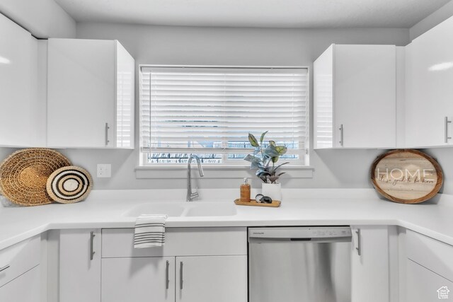 1140 W 950 N Unit E202, Orem, UT 84057 - kitchen with stainless steel dishwasher, a sink, white cabinetry, and plenty of natural light