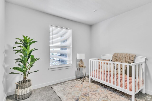 1140 W 950 N Unit E202, Orem, UT 84057 - carpeted bedroom with baseboards