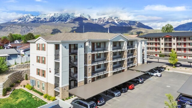 1140 W 950 N Unit E202, Orem, UT 84057 - view of property featuring uncovered parking and a mountain view