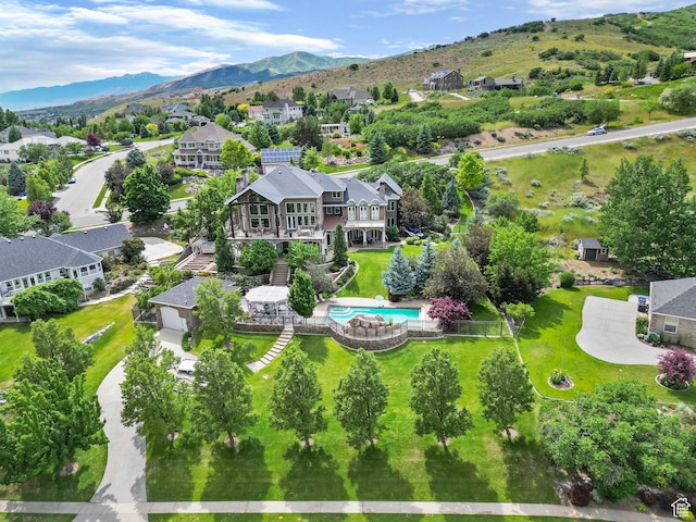 aerial view featuring a mountain view and a residential view