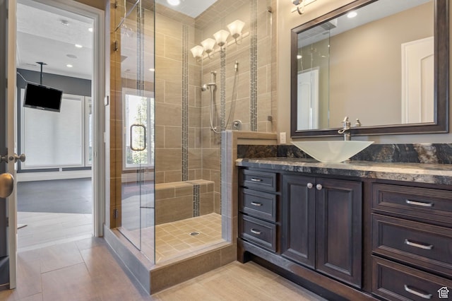 bathroom with vanity, recessed lighting, tile patterned flooring, and a stall shower