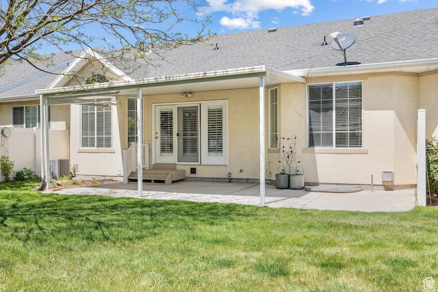 1139 Grainery Cv, Riverton, UT 84065 - back of house featuring a lawn, a patio area, roof with shingles, and stucco siding