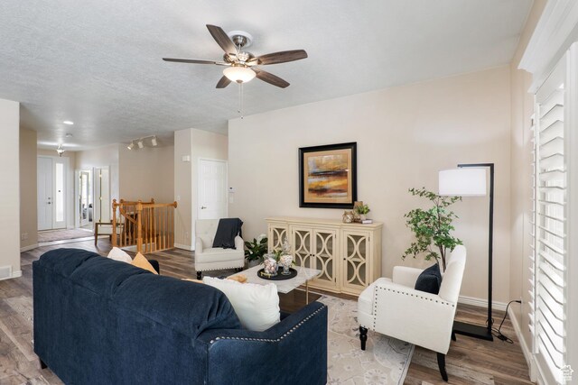 1139 Grainery Cv, Riverton, UT 84065 - living room with a ceiling fan, baseboards, wood finished floors, and a textured ceiling