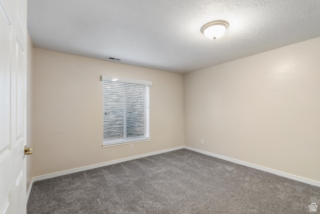1139 Grainery Cv, Riverton, UT 84065 - unfurnished room with visible vents, carpet flooring, baseboards, and a textured ceiling