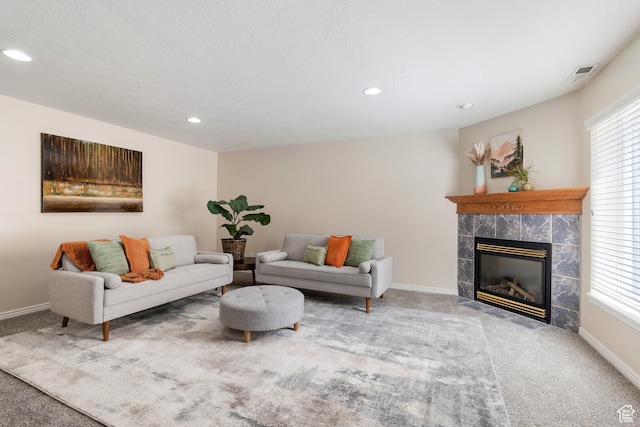 1139 Grainery Cv, Riverton, UT 84065 - carpeted living area with a high end fireplace, recessed lighting, and visible vents