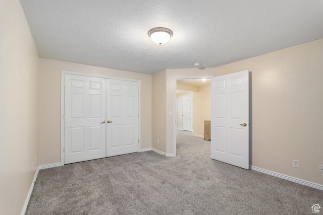 1139 Grainery Cv, Riverton, UT 84065 - unfurnished bedroom with carpet floors, a textured ceiling, baseboards, and a closet
