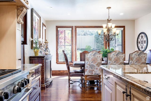 8777 S Falcon Heights Ln E, Cottonwood Heights, UT 84093 - dining area with baseboards, a notable chandelier, dark wood finished floors, and a healthy amount of sunlight