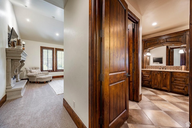 8777 S Falcon Heights Ln E, Cottonwood Heights, UT 84093 - hall featuring recessed lighting, a sink, and baseboards