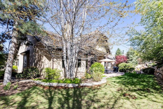 8777 S Falcon Heights Ln E, Cottonwood Heights, UT 84093 - view of yard featuring a patio area