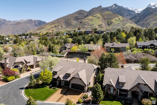 8777 S Falcon Heights Ln E, Cottonwood Heights, UT 84093 - aerial view featuring a mountain view and a residential view