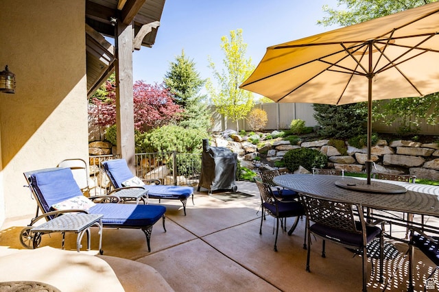 8777 S Falcon Heights Ln E, Cottonwood Heights, UT 84093 - view of patio with outdoor dining area and fence