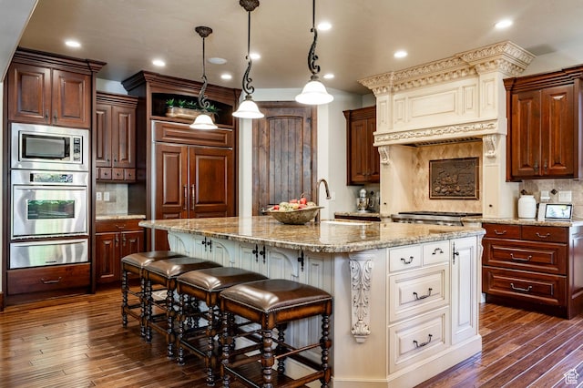8777 S Falcon Heights Ln E, Cottonwood Heights, UT 84093 - kitchen featuring stainless steel appliances, decorative backsplash, a warming drawer, and dark wood-type flooring