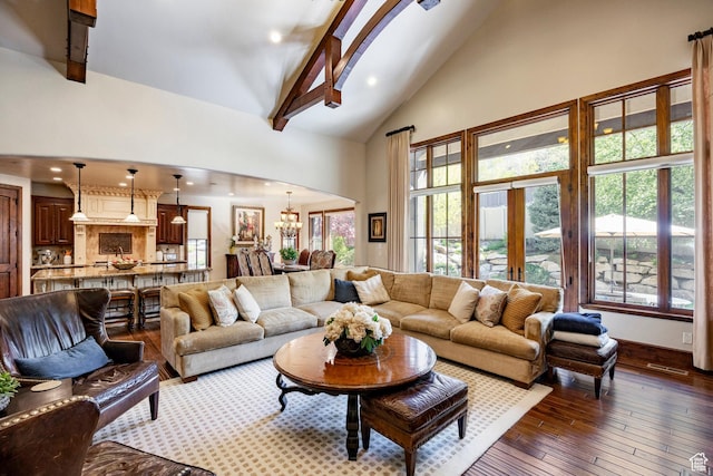 8777 S Falcon Heights Ln E, Cottonwood Heights, UT 84093 - living area featuring beam ceiling, high vaulted ceiling, dark wood-type flooring, recessed lighting, and a chandelier