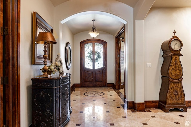 8777 S Falcon Heights Ln E, Cottonwood Heights, UT 84093 - tiled foyer entrance with arched walkways and baseboards