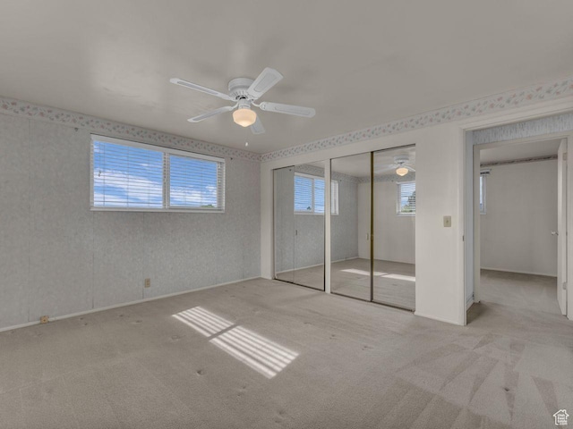 5362 W Elaine Ave, West Valley City, UT 84120 - unfurnished bedroom featuring a closet, baseboards, ceiling fan, and carpet flooring