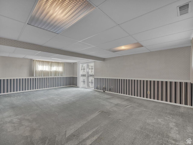 5362 W Elaine Ave, West Valley City, UT 84120 - basement with a drop ceiling, carpet flooring, and visible vents