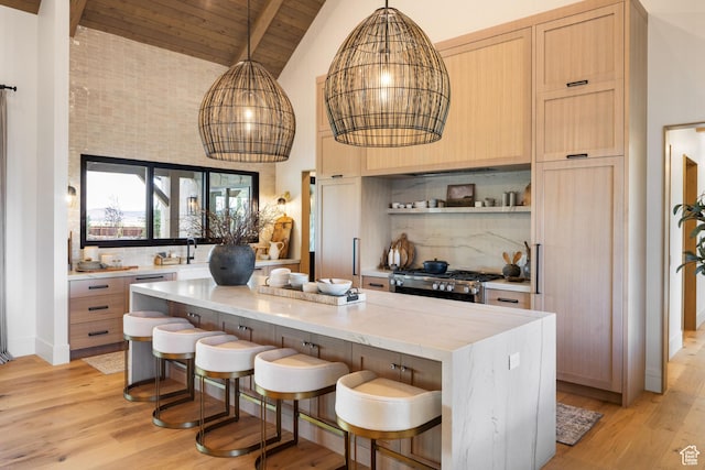 205 W Lazy Acres Ln, Kamas, UT 84036 - kitchen featuring light wood-style floors, wooden ceiling, tasteful backsplash, and stove