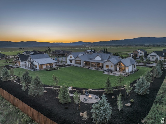 205 W Lazy Acres Ln, Kamas, UT 84036 - aerial view at dusk with a mountain view