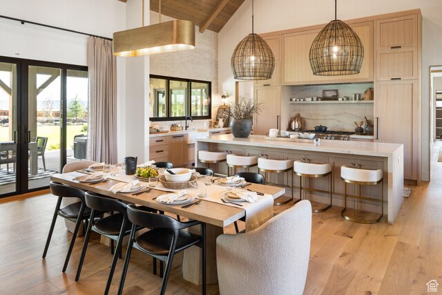205 W Lazy Acres Ln, Kamas, UT 84036 - dining room featuring high vaulted ceiling, a wealth of natural light, and light wood finished floors