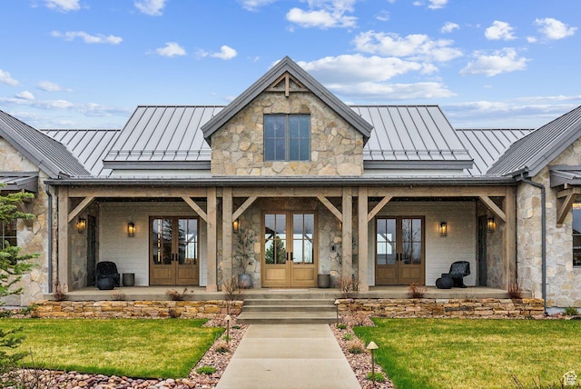 205 W Lazy Acres Ln, Kamas, UT 84036 - property entrance with a standing seam roof, french doors, metal roof, and stone siding