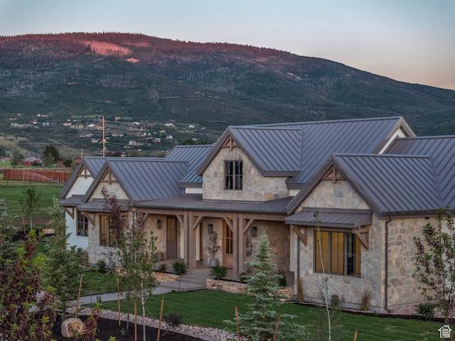 205 W Lazy Acres Ln, Kamas, UT 84036 - view of front of house featuring a standing seam roof, metal roof, a mountain view, and stone siding