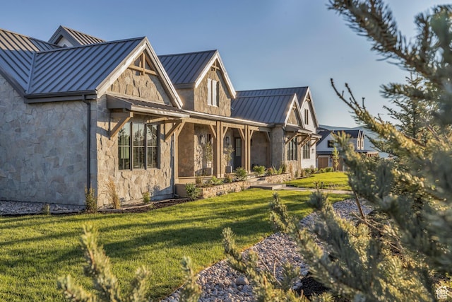 205 W Lazy Acres Ln, Kamas, UT 84036 - rear view of property featuring a yard, metal roof, stone siding, and a standing seam roof
