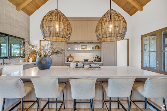 205 W Lazy Acres Ln, Kamas, UT 84036 - kitchen featuring beamed ceiling, decorative backsplash, wood ceiling, and high vaulted ceiling