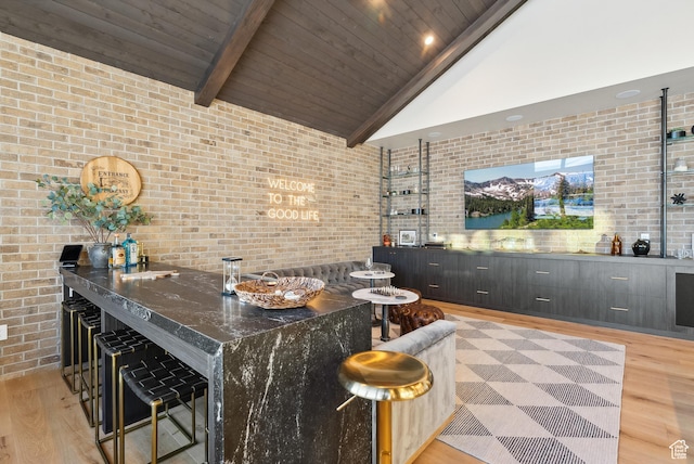 205 W Lazy Acres Ln, Kamas, UT 84036 - bar with brick wall, wet bar, beam ceiling, wooden ceiling, and light wood-style flooring