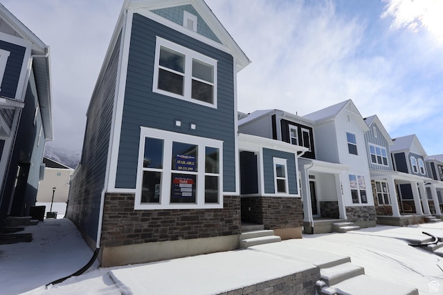 4888 W Coulter Unit 703, Highland, UT 84003 - view of front of property featuring stone siding and a residential view