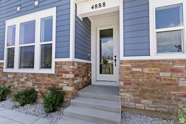 4888 W Coulter Unit 703, Highland, UT 84003 - view of exterior entry with stone siding