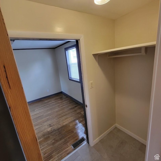 207 N Rawlins St, East Carbon, UT 84520 - interior space with baseboards, wood finished floors, and visible vents