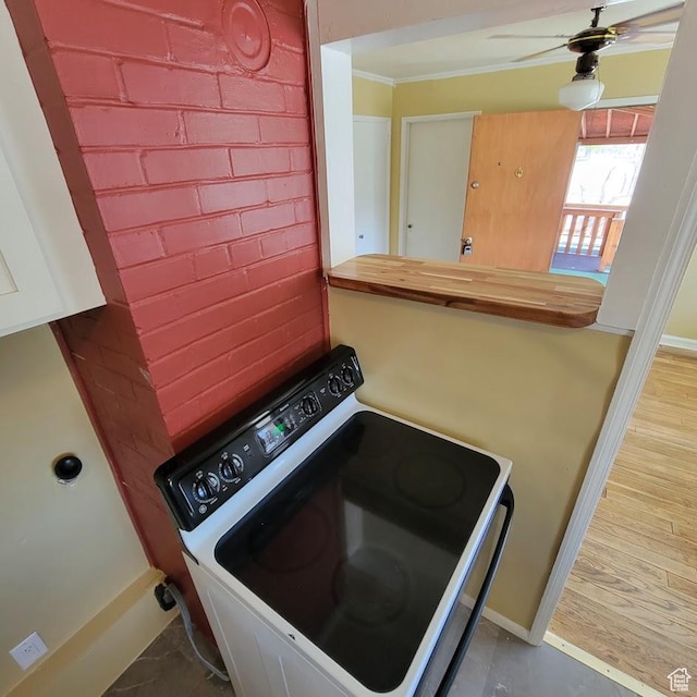 207 N Rawlins St, East Carbon, UT 84520 - laundry room featuring baseboards, ornamental molding, laundry area, and a ceiling fan