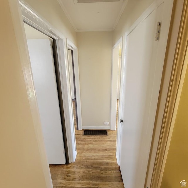 207 N Rawlins St, East Carbon, UT 84520 - hall featuring ornamental molding, wood finished floors, and visible vents