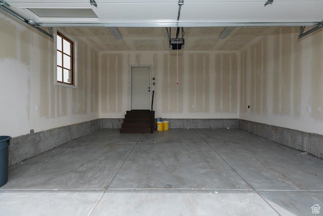 207 E Clubhouse Dr Unit 40, Garden City, UT 84028 - garage with a garage door opener